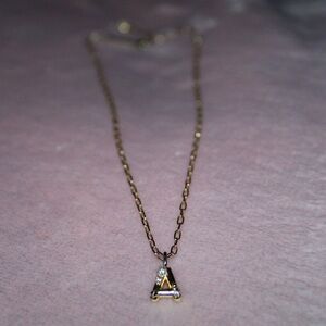 Kendra Scott Gold Necklace with A Crystal Pendant